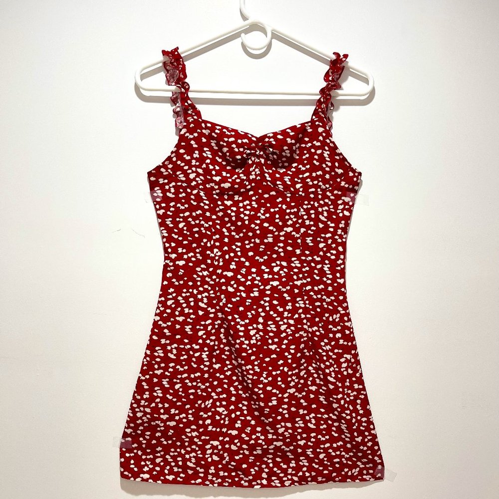 Red floral patterned short sundress with frill trim straps